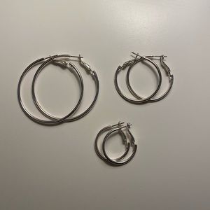 Set of three. Silver hoop earrings
